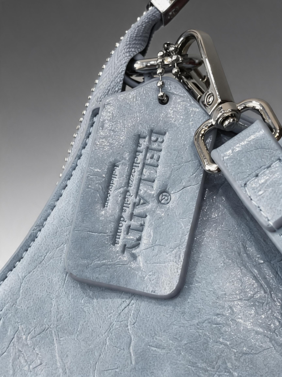 BELLAITY embossed blue bag tag with silver-tone strap hardware